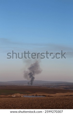 A large explosion in a field
