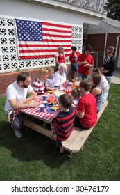 Large Family Gathering For A 4th Of July Barbeque