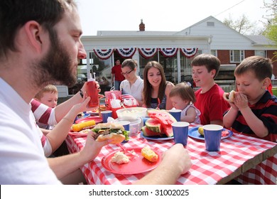 Large family gathering for a 4th of July barbecue