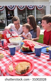 Large Family Gathering For A 4th Of July Barbecue