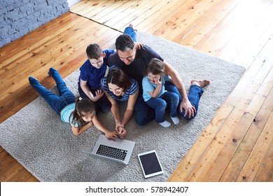 Large Family At Home Watching A Movie