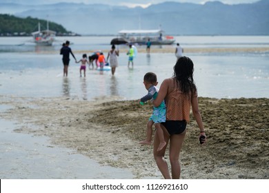 Large Family On A Holiday At Manjuyod Sandbar, Philippines