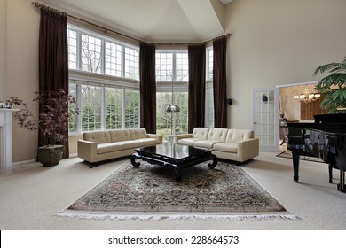 Large Family Room With Two Story Windows