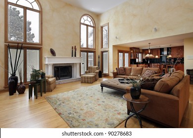 Large Family Room With Two Story Curved Windows