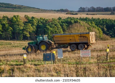 Large Farm Tractor Towing A 12 Tonne Tipping Trailer  