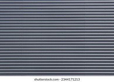 Large flat surface of a building clad in gray metal roof sheets