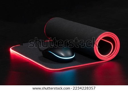 large flexible backlit mouse pad on a dark background 2022