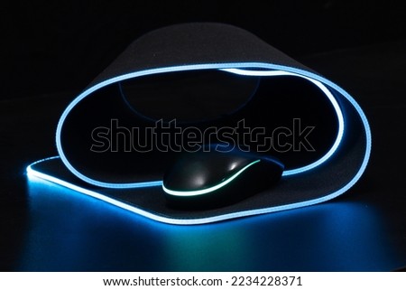 large flexible backlit mouse pad on a dark background 2022