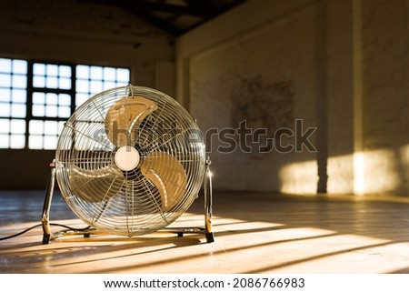 large floor fan in old empty loft