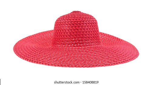 A large floppy red straw hat for ladies on a white background. 