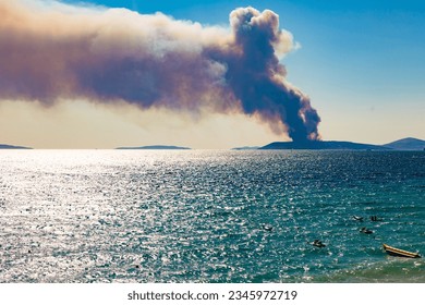 
A large forest fire on the island during the holiday season over the island.