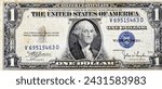 Large fragment of the Obverse side of 1 one dollar bill banknote series 1935 with the portrait of president George Washington, old American money banknote, vintage retro, United States of America