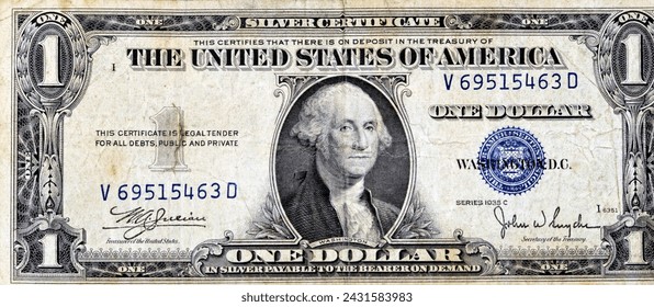 Large fragment of the Obverse side of 1 one dollar bill banknote series 1935 with the portrait of president George Washington, old American money banknote, vintage retro, United States of America - Powered by Shutterstock