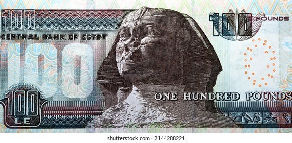 Large fragment of the reverse side of 100 LE one hundred Egyptian pounds banknote series 2017 features the Sphinx of Giza, selective focus of Egypt cash money bill by central bank of Egypt