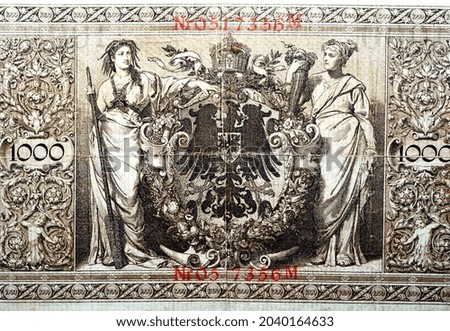 Large fragment of the reverse side of 1000 one thousand German marks Reichsmark banknote currency issued 1910 by Reichsbank in Berlin features Allegorical figures navigation, agriculture and arms