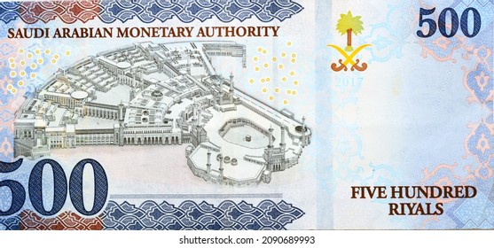 Large fragment of the reverse side of 500 five hundred Saudi riyals banknote features Kaaba in Mecca city inside the holy mosque series 1438 AH, Selective focus of Saudi Arabia currency