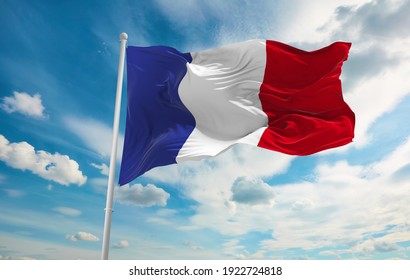 Large French Flag Waving In The Wind