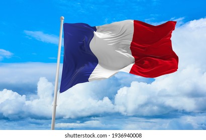 Large French Flag Waving In The Wind