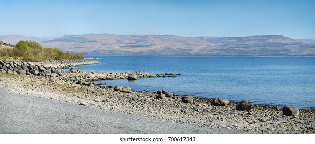 Large Freshwater Lake Of Gennesaret In North Palestine On Gergesa Land At Autumn. Panoramic View From     With Space For Text On Blue Sky