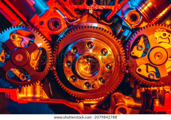 Large gears in a car\
engine close up