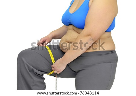 Large girl body part with measuring tape isolated in white