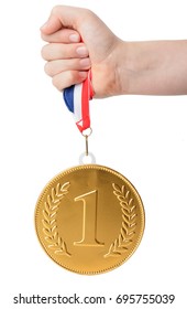 A Large Gold Number One Medal Held Up