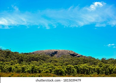 Large Granite Monolith Or Dome Centered, Surrounded By Jarrah Trees, South West Of Western Australia.