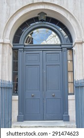 Large Grey Door With Half Circle Window