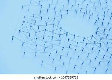 A large grid of pins connected with string. Communication, technology, network concept