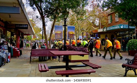 Large Group Of Australian Airforce Cadets In Brightly Coloured Vests Walking Through The Mall, Windsor, New South Wales On 22.06.2019 (training For International Games)                               