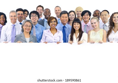 Large Group of Business People Holding Board