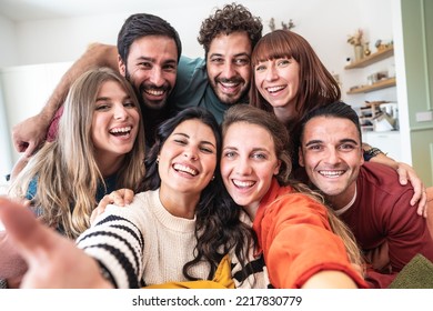 A large group of caucasian friends taking selfie sitting in living room of modern hostel  - Shutterstock ID 2217830779