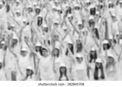 Large group of defocused people/crowd.