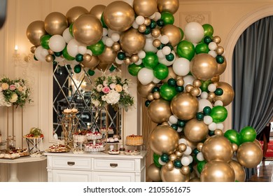 Large Group Of Different Desserts Arranged On Marriage Event With Balloons And Flowers In Luxury Restaurant On White Furniture. Wedding, Party Concept, Catering Concept