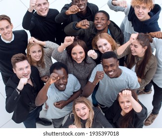 Large Group Of Diverse Young People Looking At The Camera .