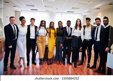 Large Group Of Eleven Multiracial Business People Standing At Office. Diverse Group Of Employees In Formal Wear.