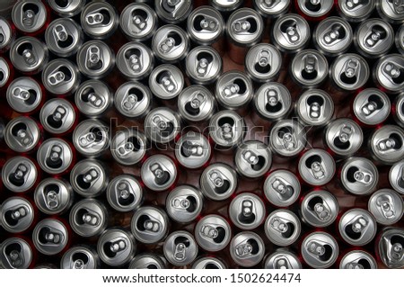 A large group of empty soda cans top view