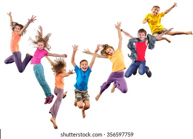 Large group of happy cheerful sportive children jumping and dancing. Isolated over white background. Childhood, freedom, happiness concept.