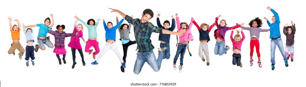 Large Group Of Happy Kids Jumping With Teacher Isolated In White