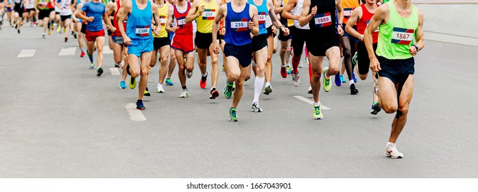 large group man runners running marathon on city street