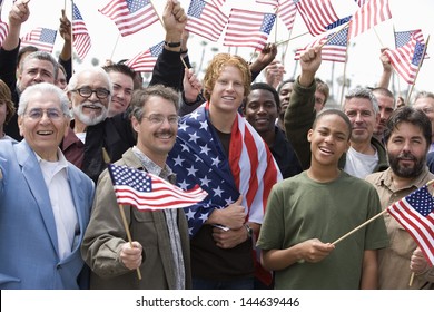 Large Group Of Men Holding American Flag