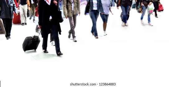 A Large Group Of Passengers. Panorama. Motion Blur.  White Background.