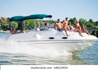 Large Group Of People Sailing And Having Fun On A Yacht.