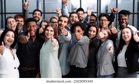 Large Group of people standing together in studio showing thumbs up - Shutterstock ID 2325095345