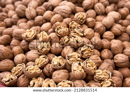 Large group of wallnut fruit background. High quality photo