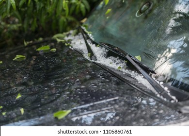 Large Hail Ice Balls On Car Hood After Heavy Summer Storm