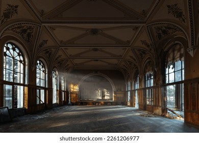 Large hall of abandoned building in gothic style. - Powered by Shutterstock