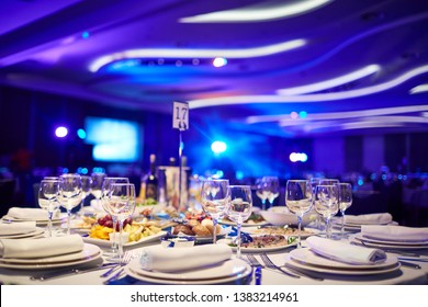 a large hall with laid tables awaits guests - Shutterstock ID 1383214961