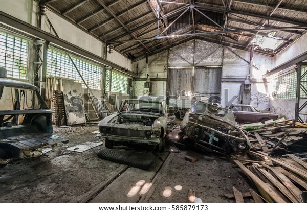 large hall with old\
cars