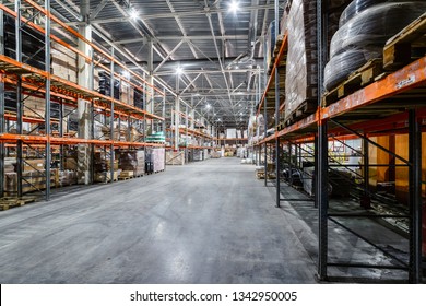 Large hangar warehouse industrial and logistics companies. Warehousing on the floor and called the high shelves.